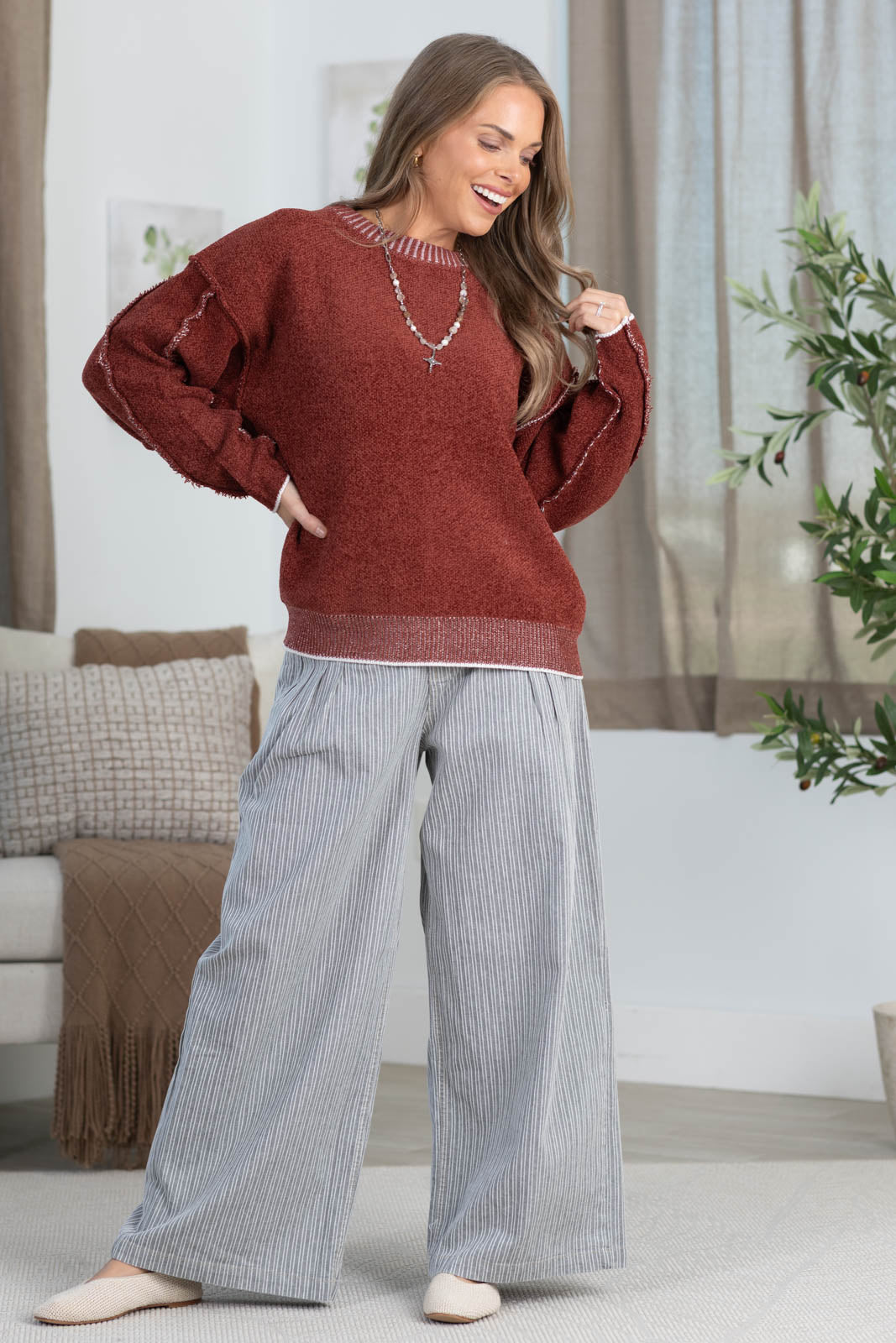 Sweater with Exposed Seam Detail