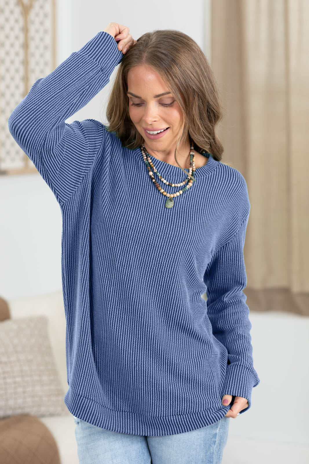 Raised Rib Curved Hem Long Sleeve Knit Top