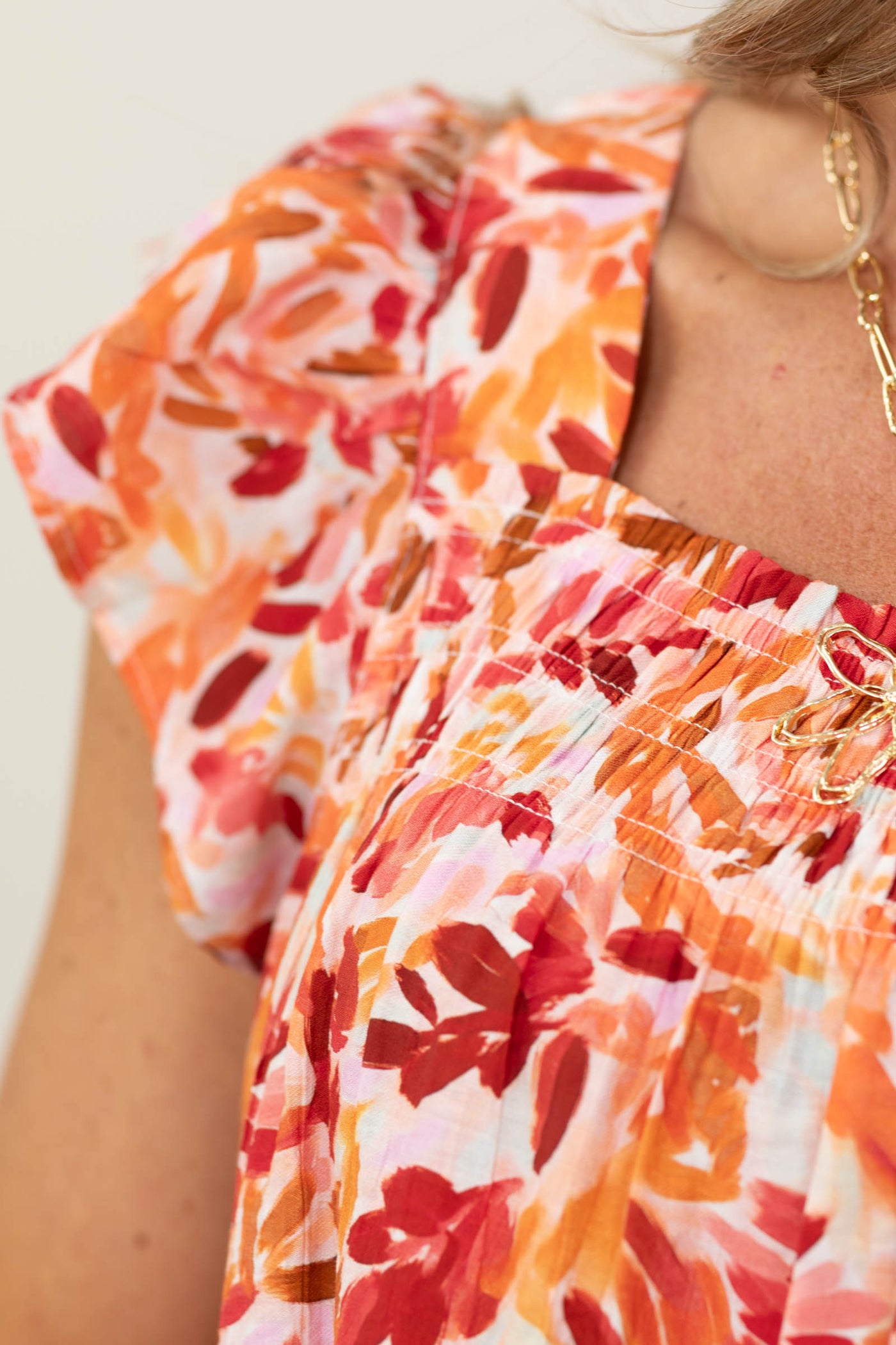 Staccato Coral Smocked Chest Floral Woven Top