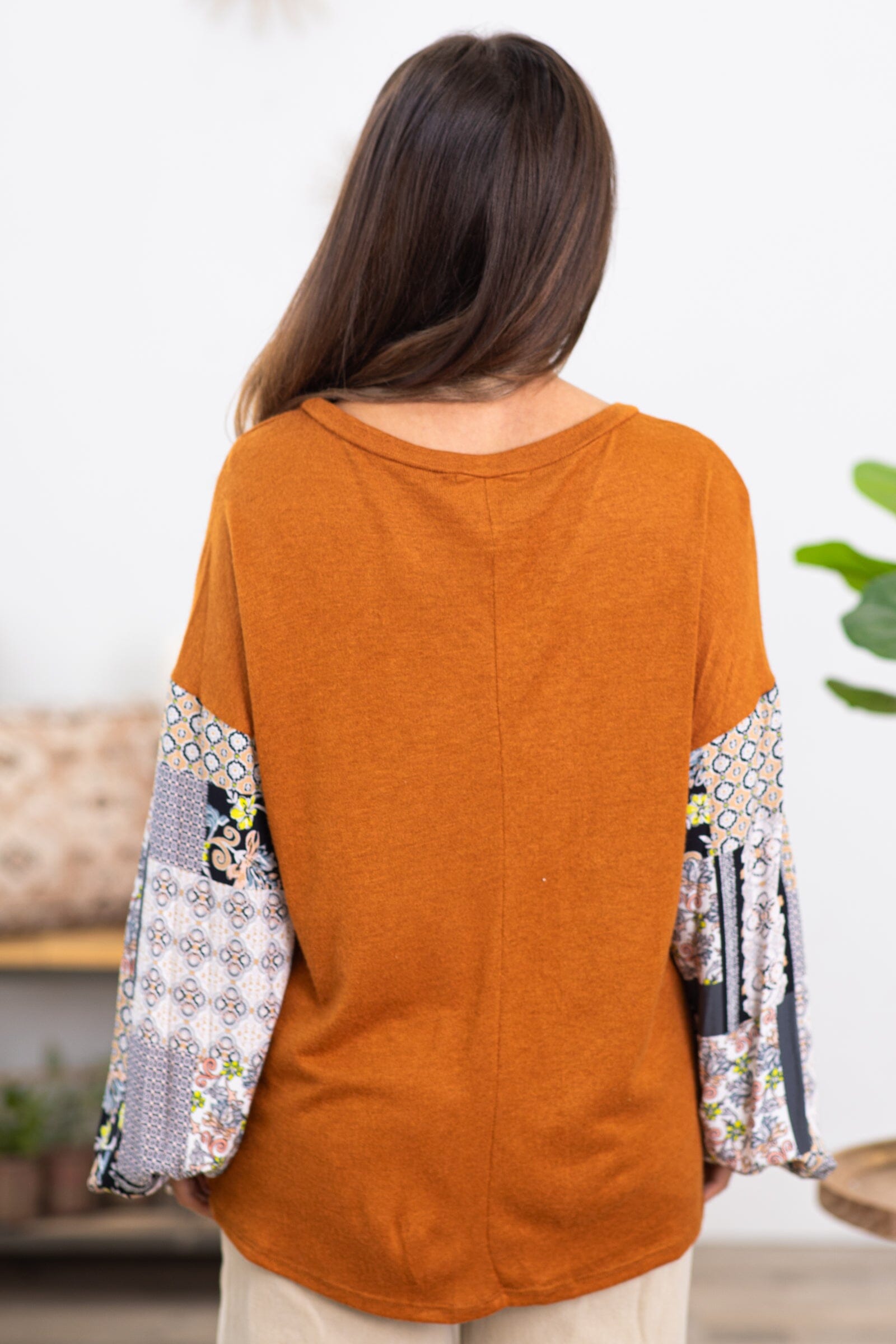 Burnt Orange Top With Paisley Print Sleeves - Filly Flair