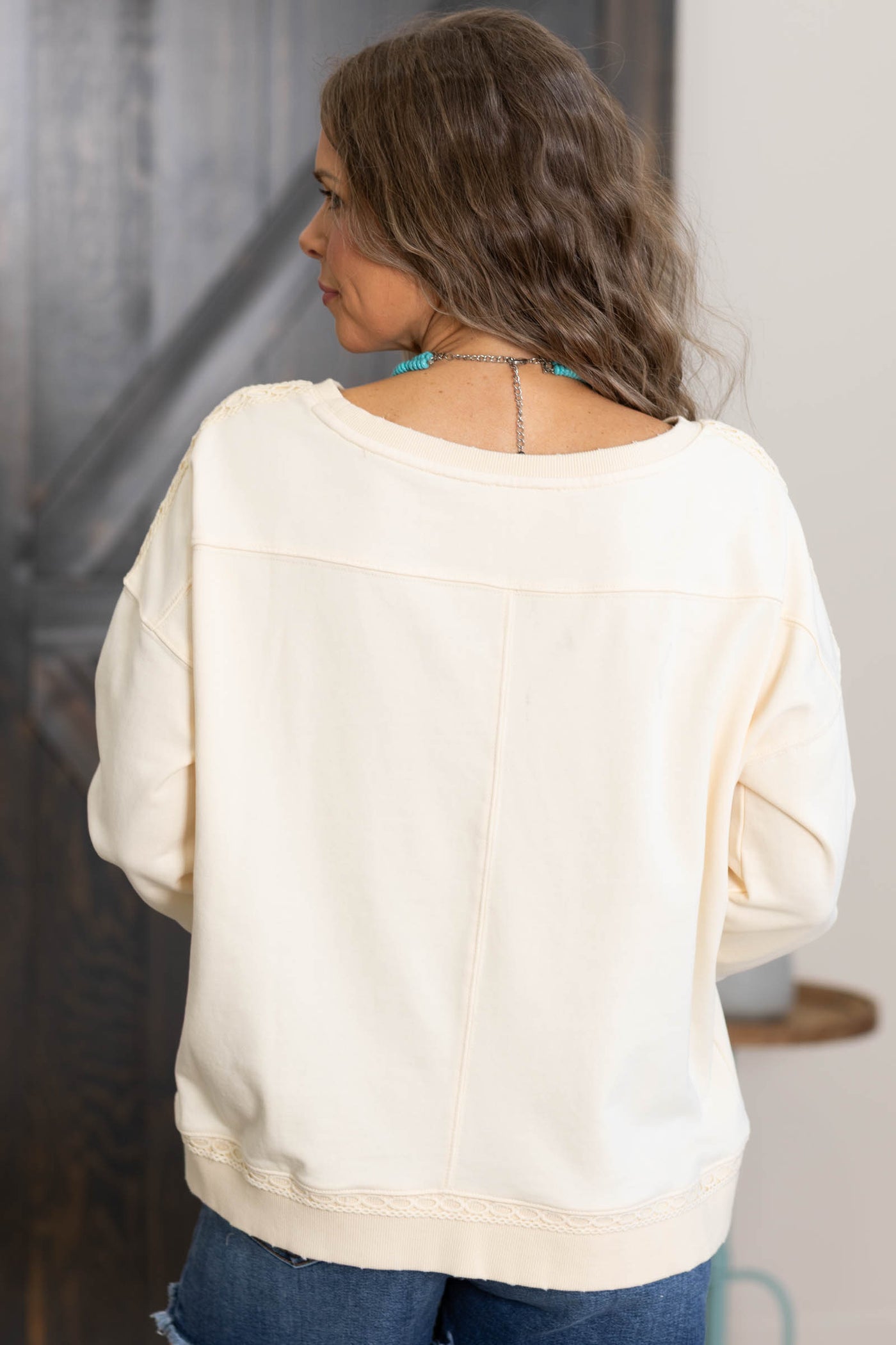 Cream Knit Top With Boot Embroidered Pocket
