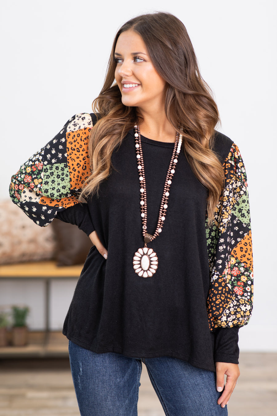Black Top With Floral Patchwork Print Sleeves