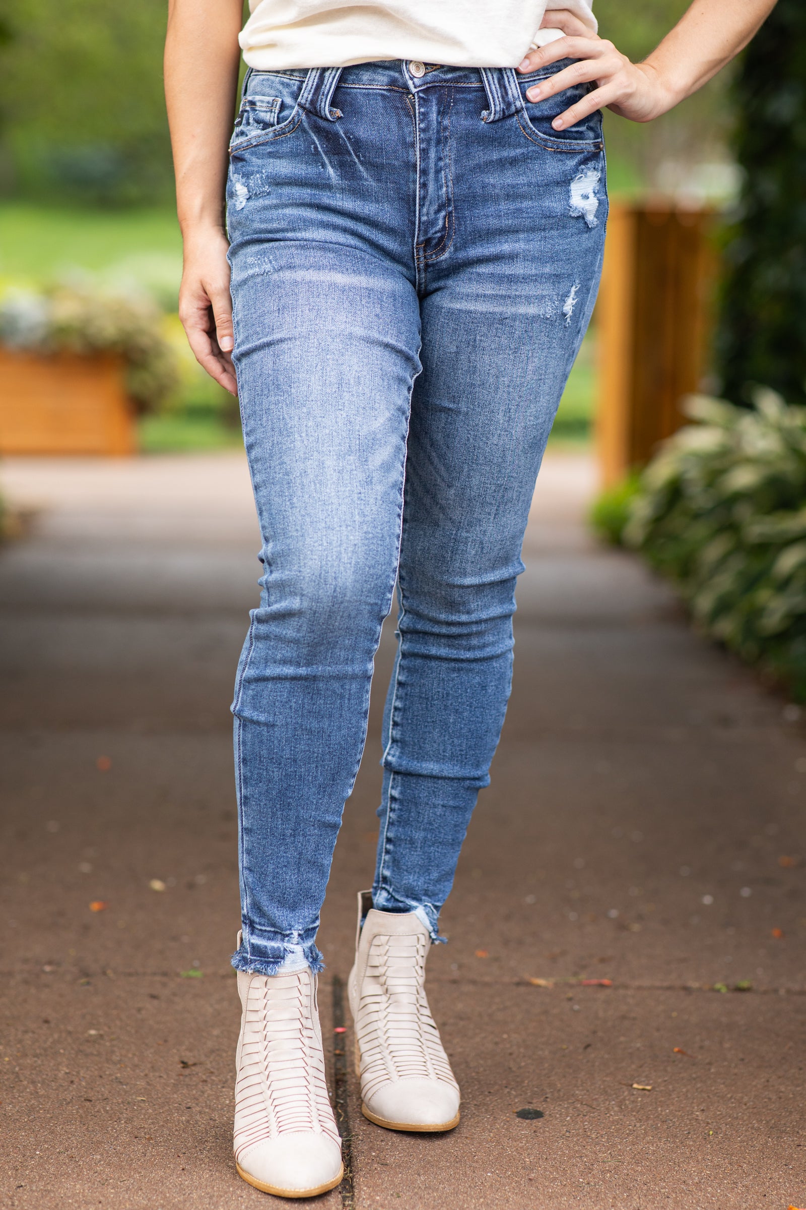 KanCan Skinny Jeans With Distressed Hem