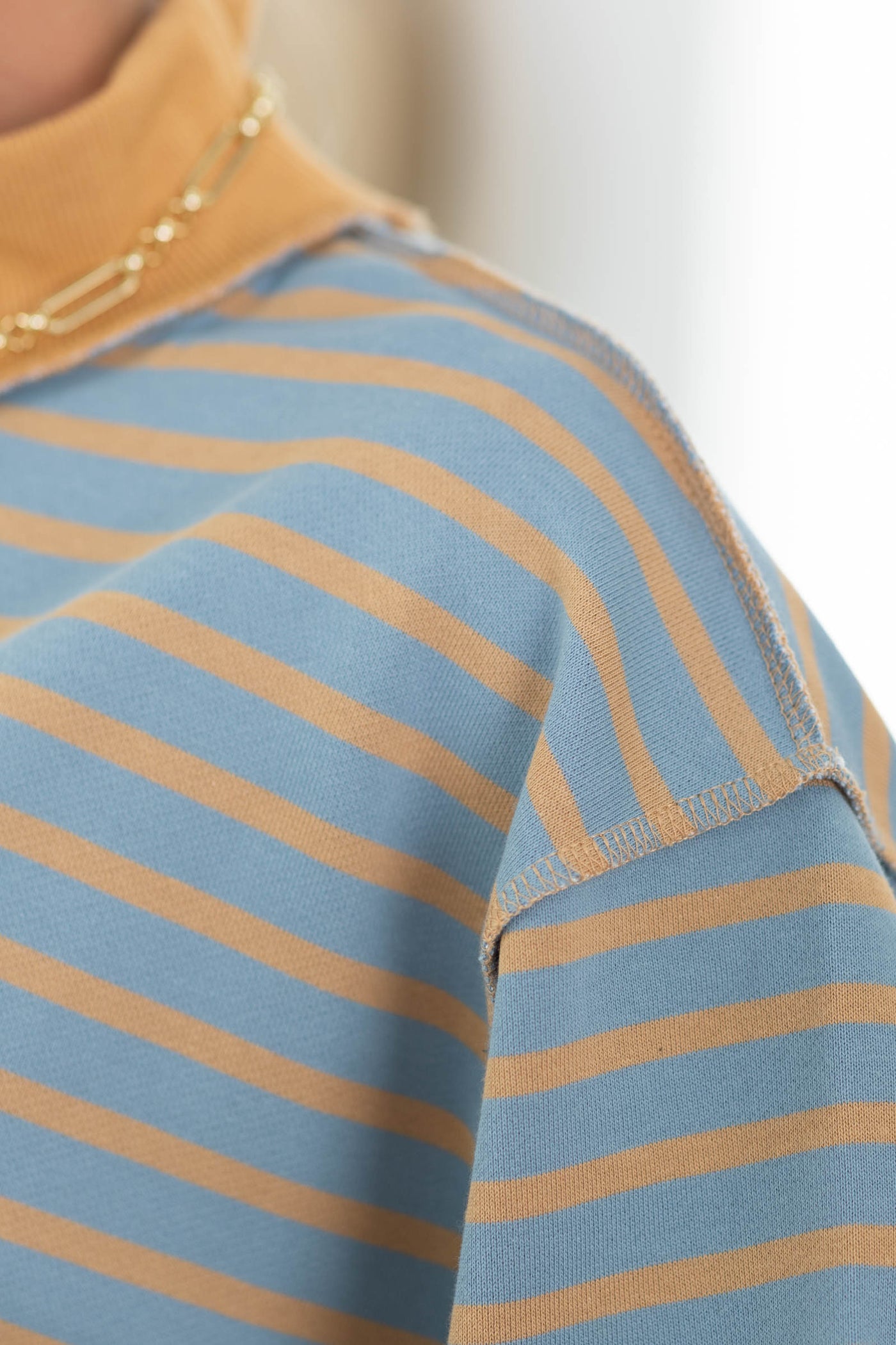 Dusty Blue And Copper Stripe Mock Neck Pullover Top
