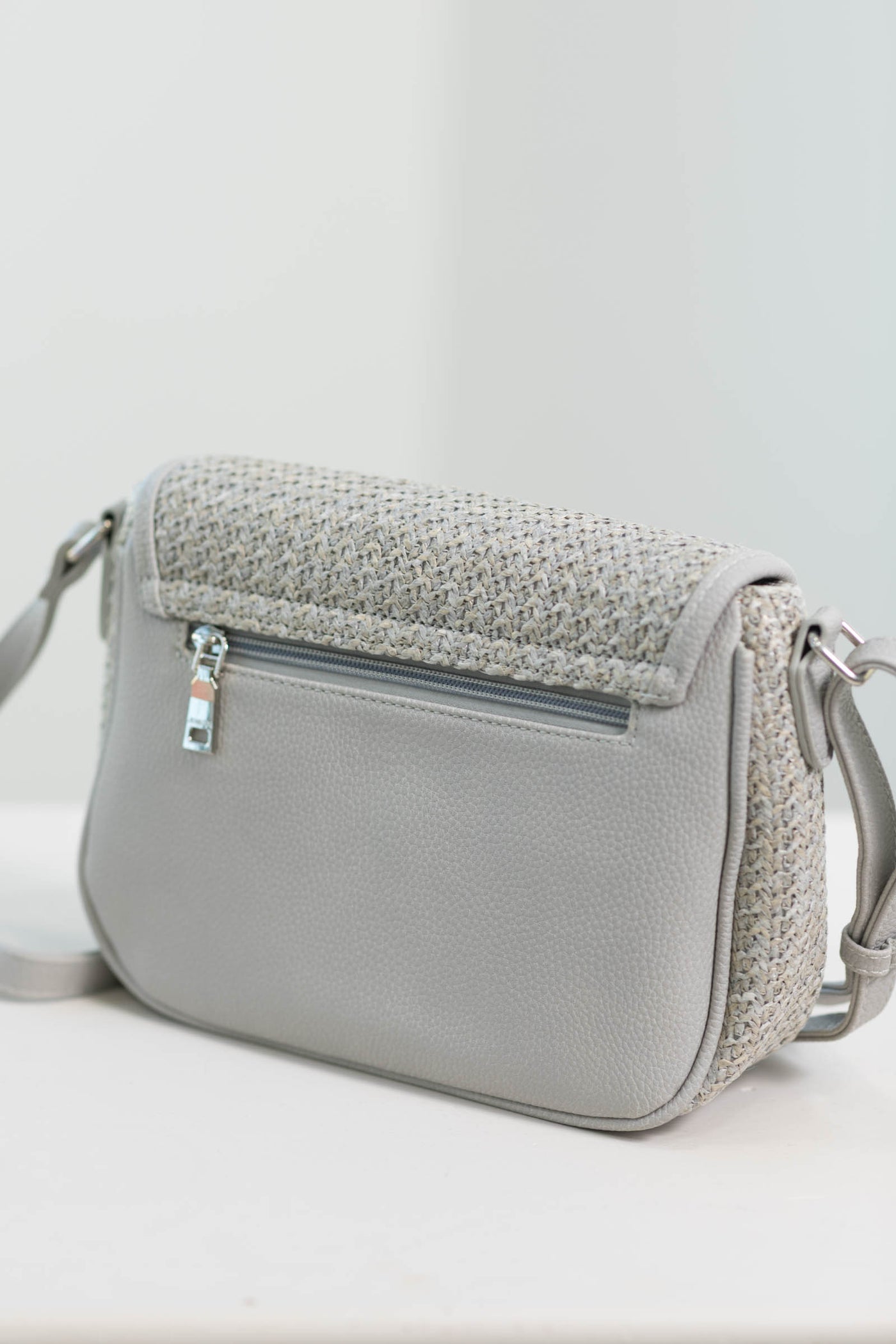 Grey Laser Cut Woven Crossbody Bag