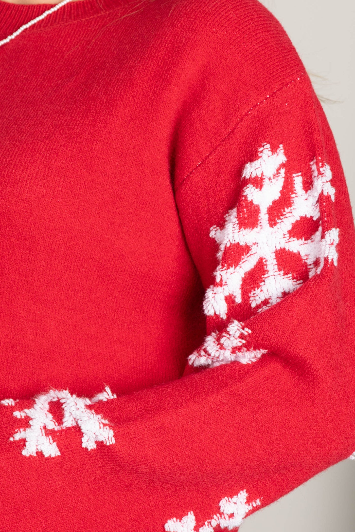 Red Sweater With Snowflake Sleeves