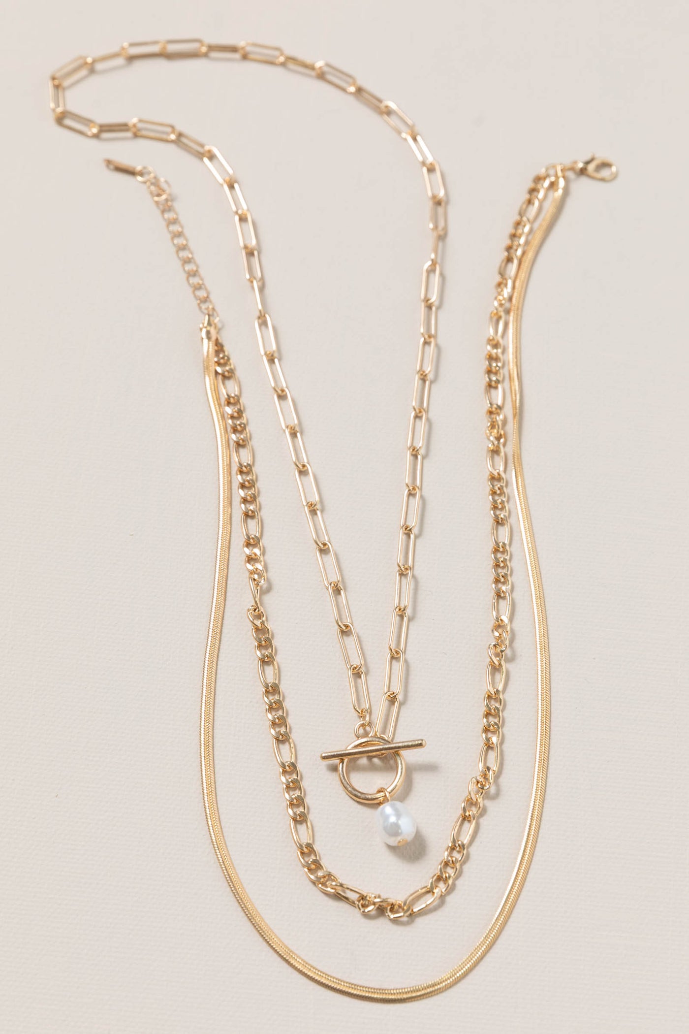 Gold Pearl Pendant with Layered Chain Necklace