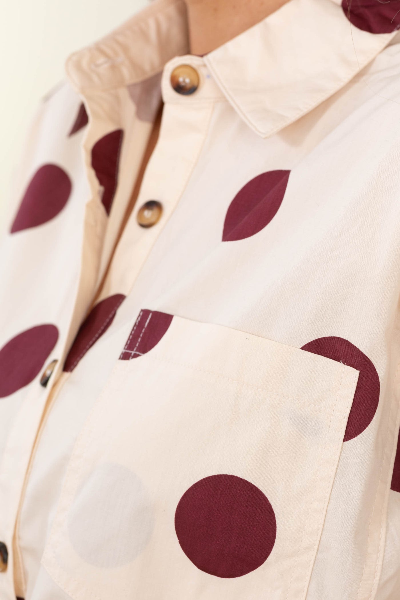 Cream and Burgundy Polka Dot Ruffle Hem Top