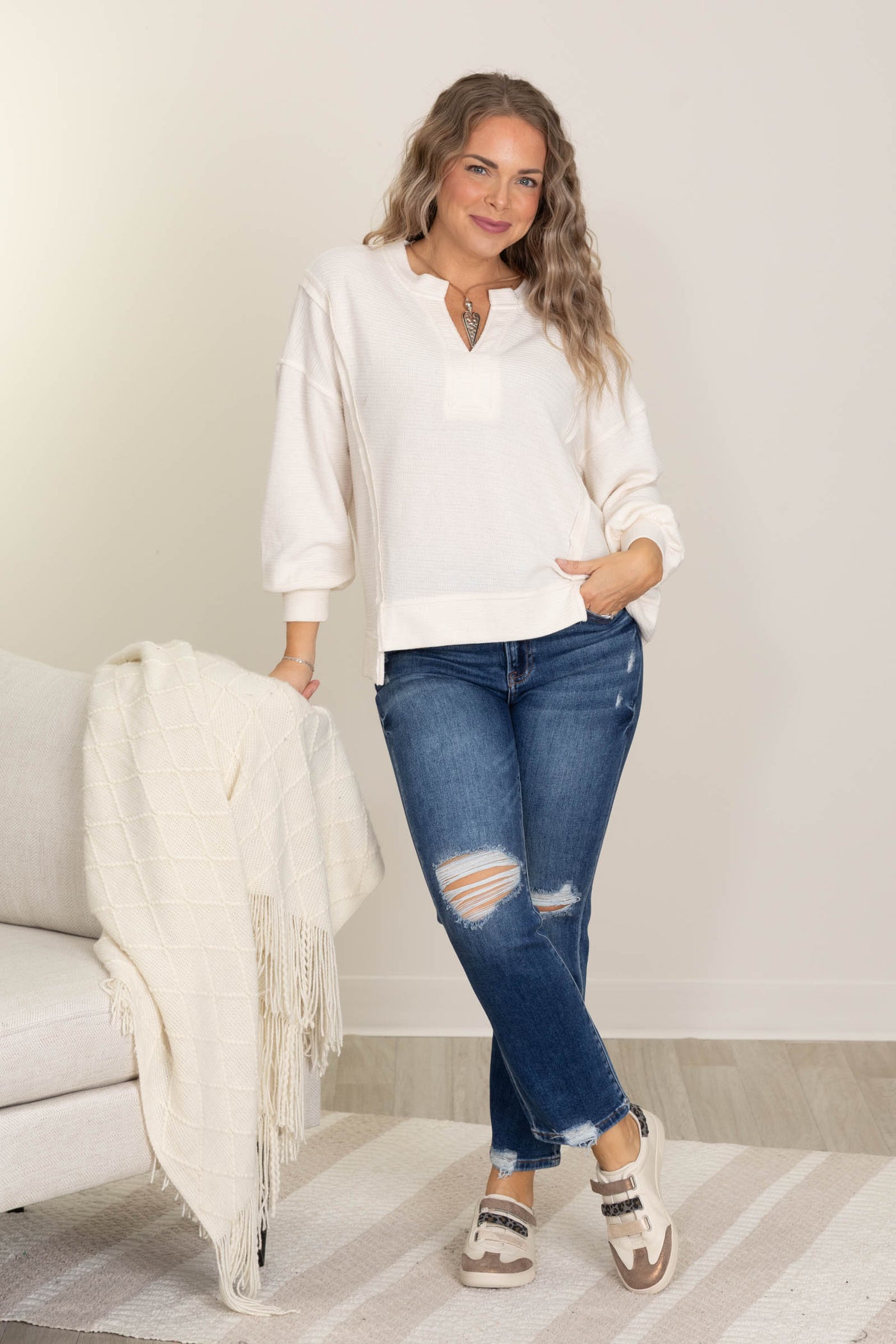 Ivory Split Neck Exposed Seam Knit Top