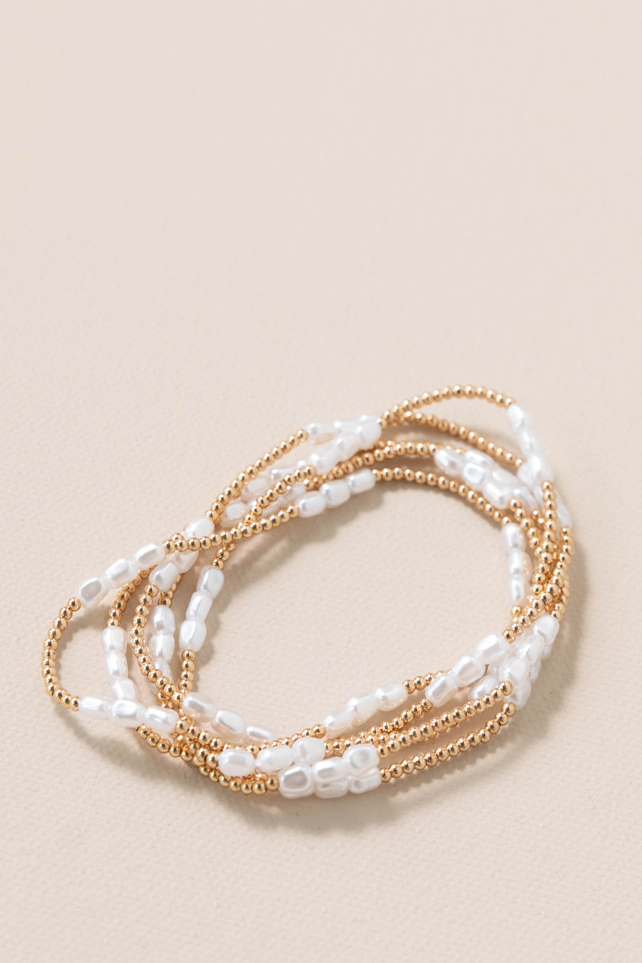 Five Metal Tone Beaded Pearl Stretch Bracelets