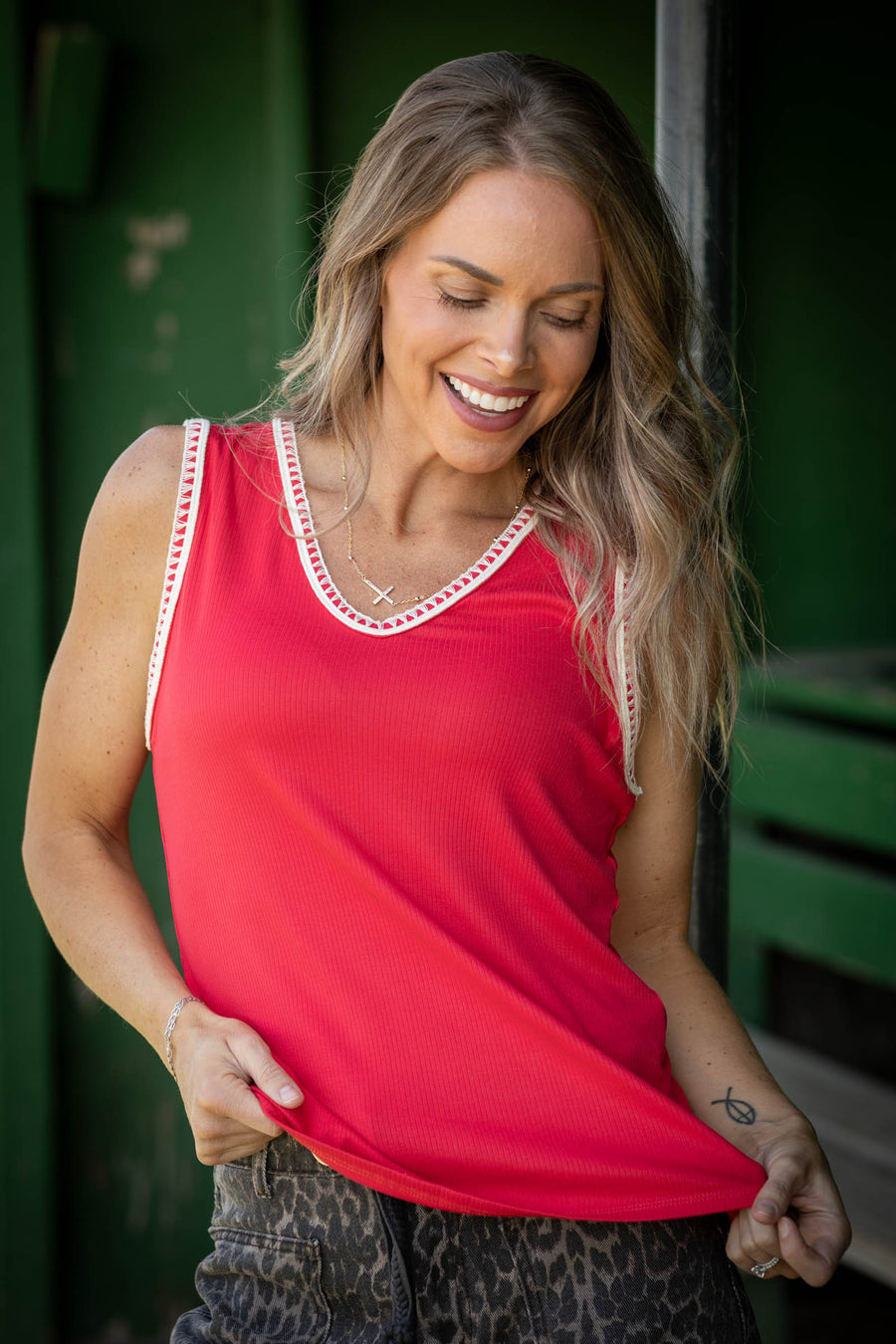 Sleeveless Top with V-Neck and Trim Detail
