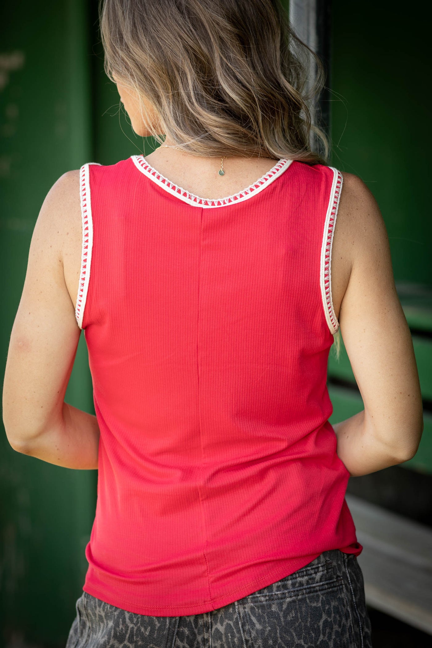 Sleeveless Top with V-Neck and Trim Detail