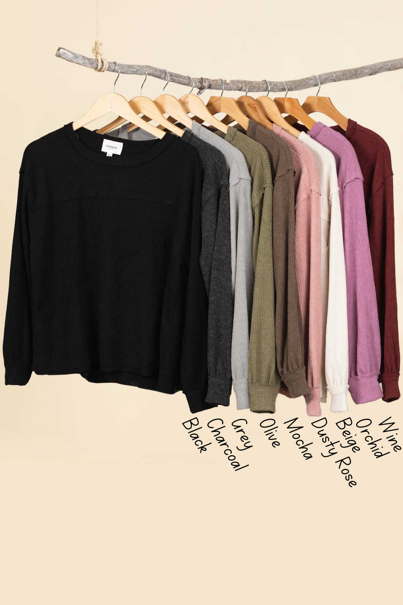 Solid Knit Top With Asymmetrical Exposed Seams